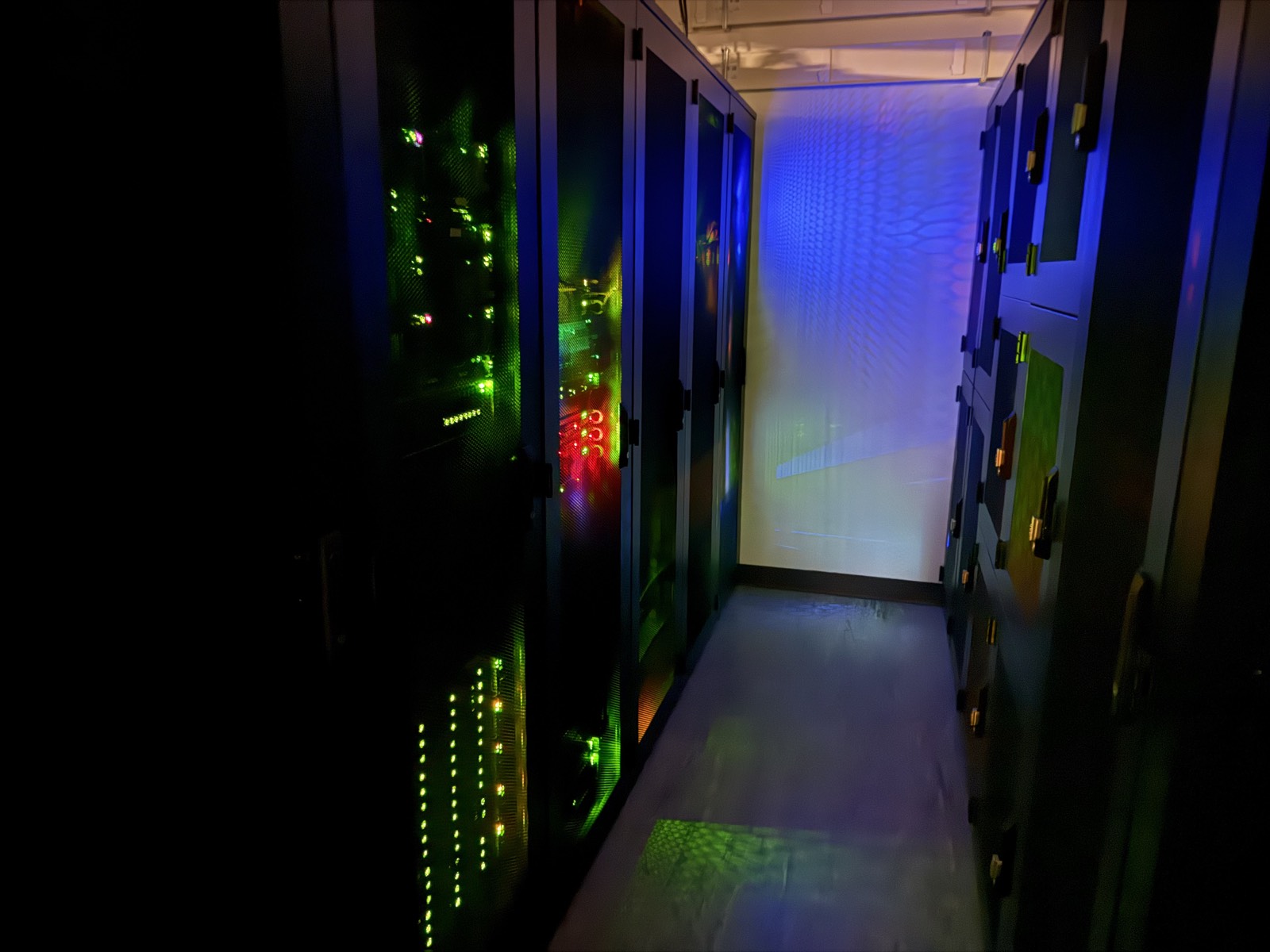 A cold-aisle of racks in a FyfeWeb London data centre
